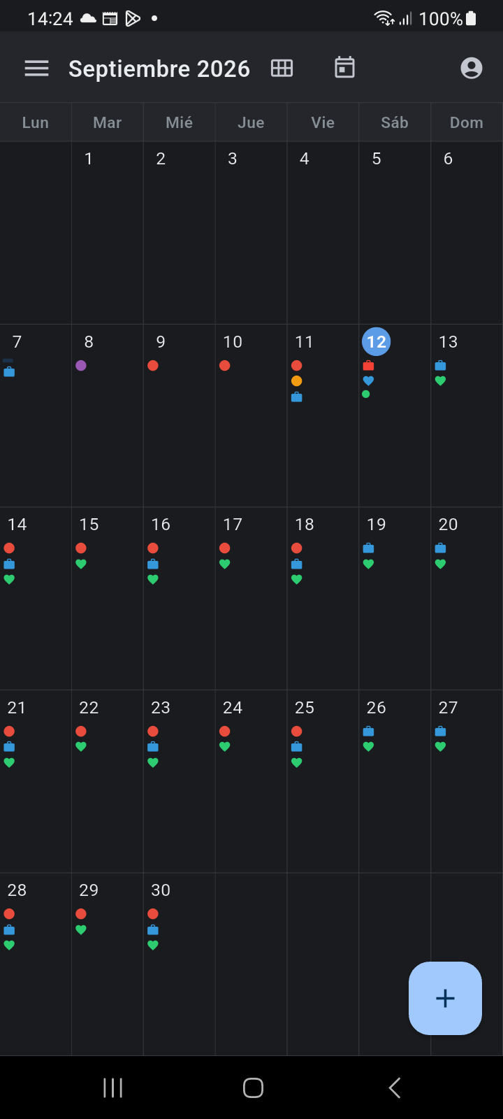 Vista Mensual de Ancora mostrando la matriz de calendario de 7 columnas con indicadores de densidad de eventos y fecha actual destacada
