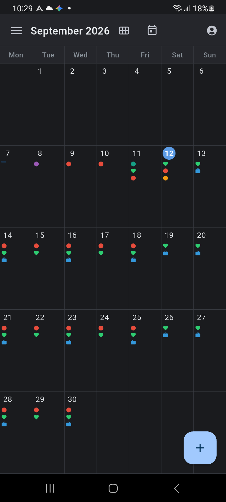 Ancora Month View showing the 7-column calendar matrix with event density indicators and today highlight